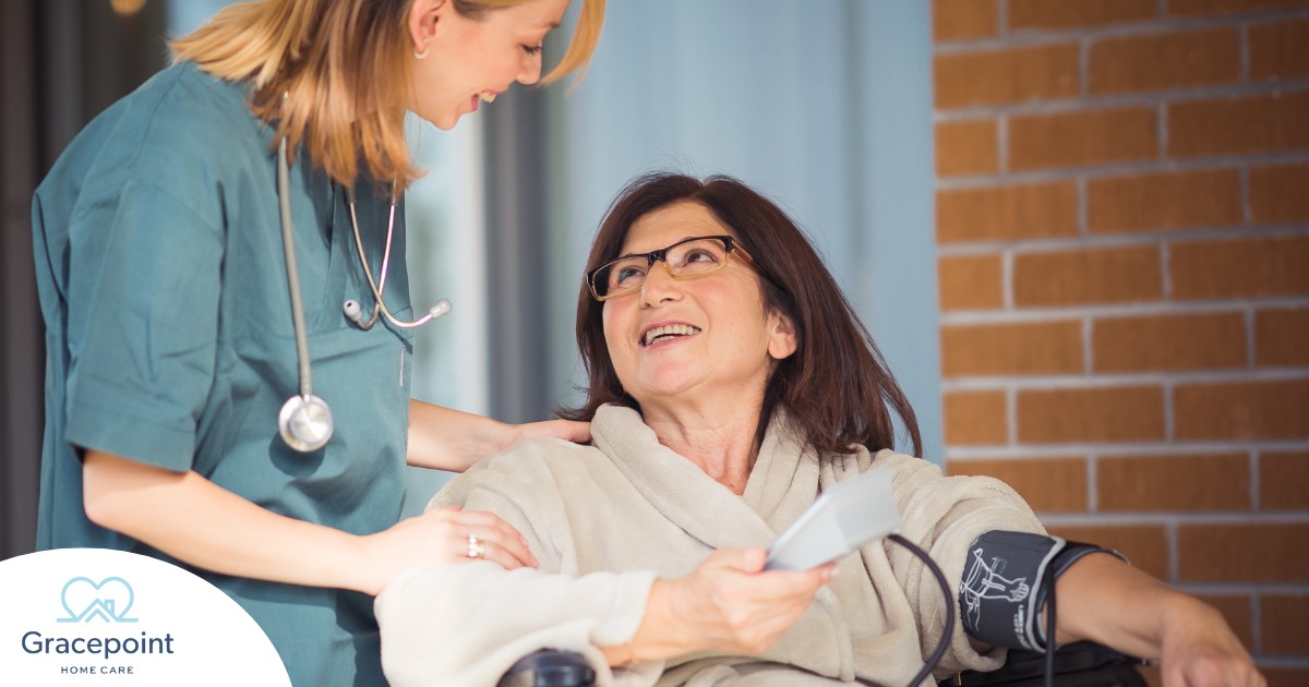 A care provider helps a patient in a wheelchair representing the benefits of medical care at home.