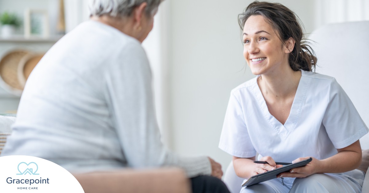 A woman smiles while with a client representing the pros of the home care industry.