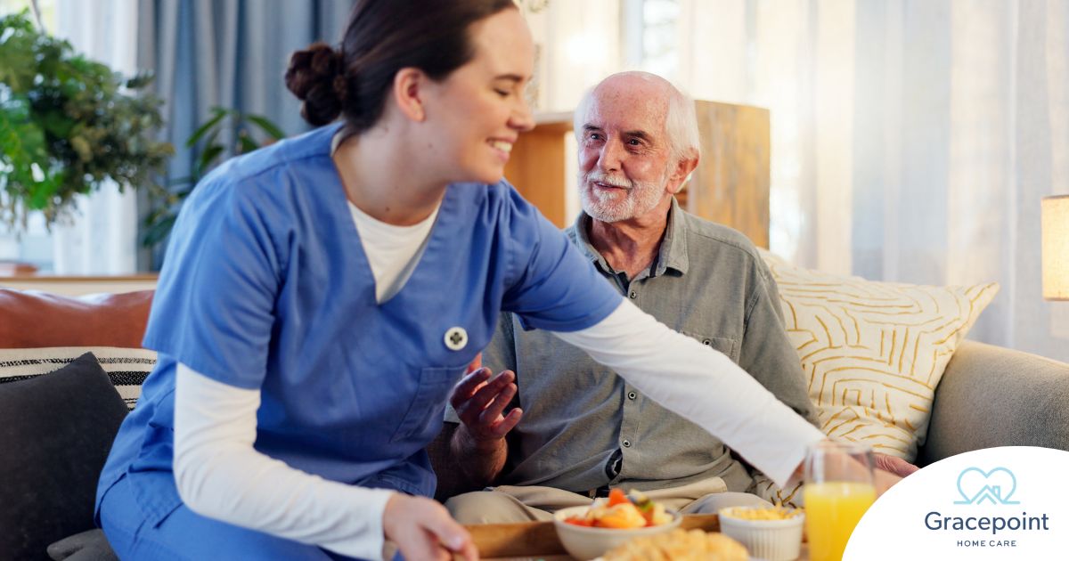 Caregiver providing senior care at home to manage parkinson’s and related symptoms.