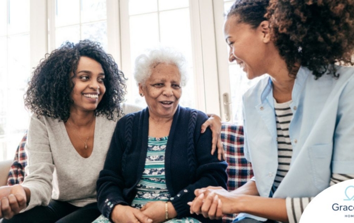 Caregiver talking to a family about Elderly Care